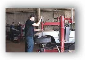 Technicians working on tires