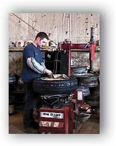 Technician working on tire